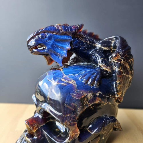 Blue Amber Skull & Dragon Carving | Imperium Draconis