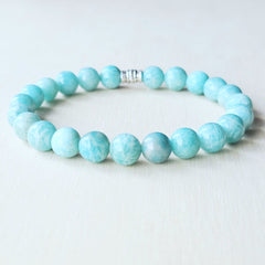 Amazonite crystal bracelet handmade with intention, showing natural 8 mm beads and soft aqua tones