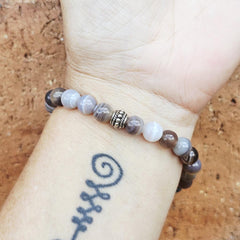 Botswana Agate beaded bracelet worn on wrist – emotional balance crystal