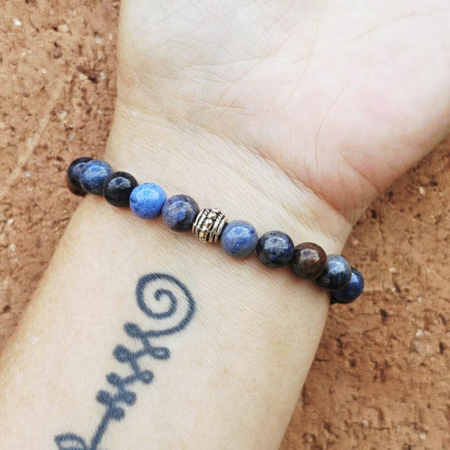 Genuine Dumortierite crystal bracelet promoting serenity and mental clarity.