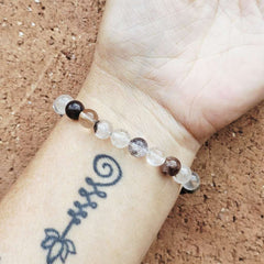 Inclusion Quartz gemstone bracelet amplifying energy and spiritual balance.