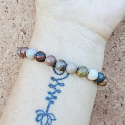 Beaded Petrified Wood bracelet symbolising strength and personal growth.