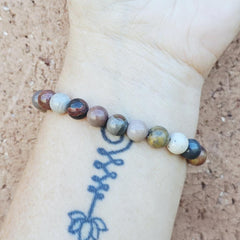 Beaded Petrified Wood bracelet symbolising strength and personal growth.