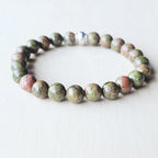 Handmade Unakite crystal bracelet for heart chakra balance and grounding.