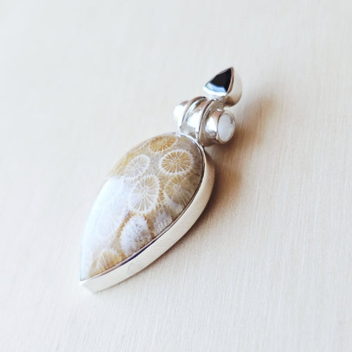 Coral Fossil and faceted Black Onyx Pendant | Ancient Tide
