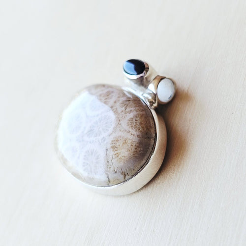 Coral Fossil and faceted Black Onyx Pendant | Onyx Tide