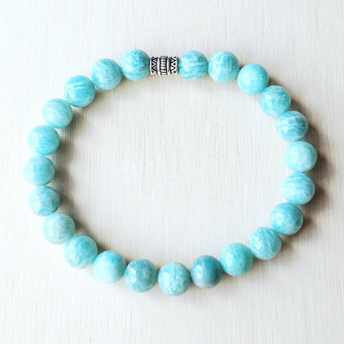 Authentic Amazonite crystal bracelet on white background, handcrafted for peace, calm energy and compassion