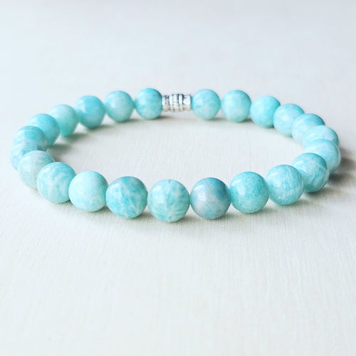 Amazonite crystal bracelet handmade with intention, showing natural 8 mm beads and soft aqua tones