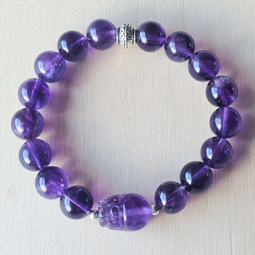 Amethyst Pixiu bracelet symbolising protection, prosperity, and spiritual peace.