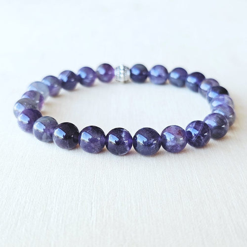 Handmade Amethyst and Smoky Quartz crystal bracelet for balance and grounding.
