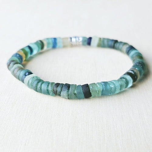 Ancient Roman Glass bracelet handmade in Australia from genuine archaeological glass with shifting light and natural patina.