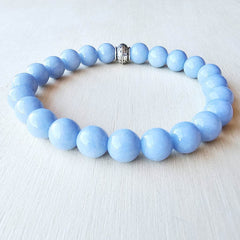 Angelite gemstone bracelet symbolising peace, truth and emotional balance.