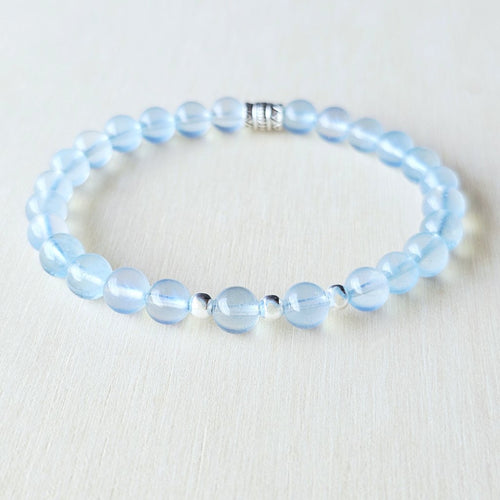 Aquamarine gemstone bracelet symbolising peace, confidence and emotional balance.