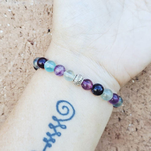 Rainbow Fluorite crystal bracelet for spiritual alignment and focus.