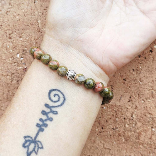 Unakite gemstone bracelet harmonising strength and compassion.