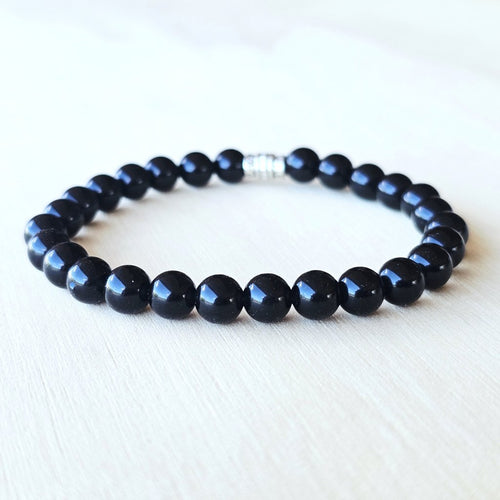 Handmade Black Obsidian crystal bracelet for grounding and psychic protection.