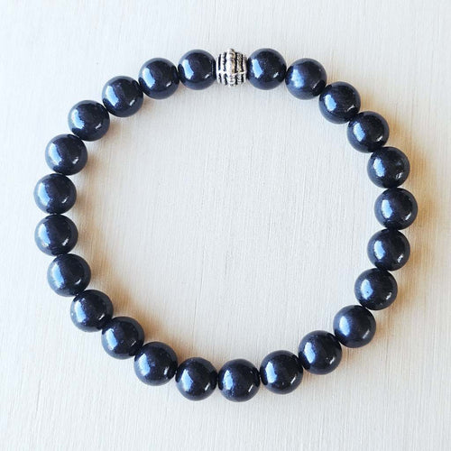 Natural Shungite crystal bracelet for balance and energetic cleansing.