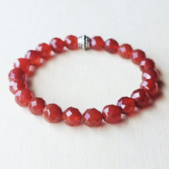 Carnelian crystal bracelet close-up, handmade design for men and women.