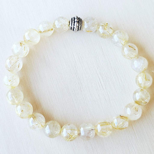 Natural Rutilated Quartz gemstone bracelet for men and women.