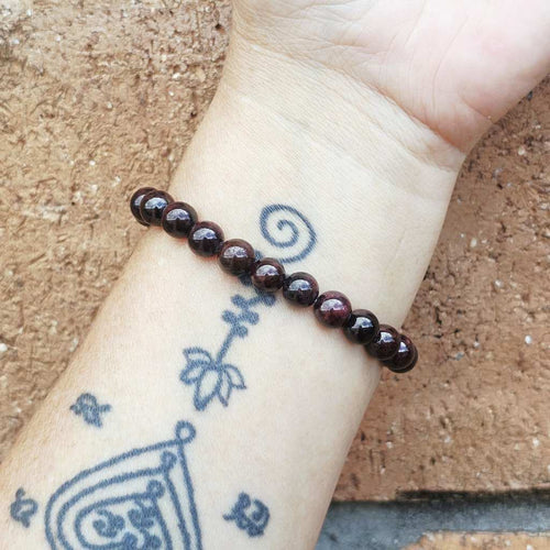Handmade Garnet bracelet with natural gemstones and strong energy.