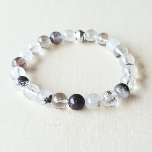 Inclusion Quartz crystal jewellery for focus, grounding, and individuality.