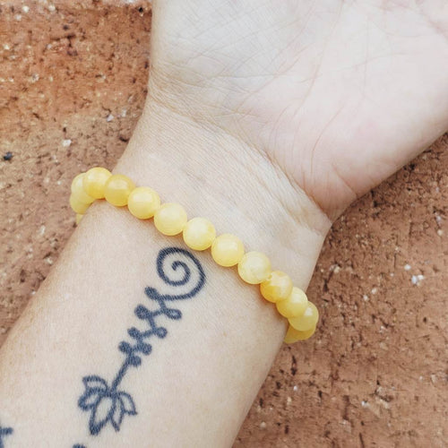 Beaded Orange Calcite bracelet with warm, uplifting energy and focus.