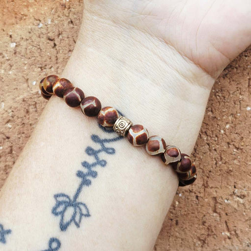 Crystal bracelet for grounding, heart healing, and emotional strength.