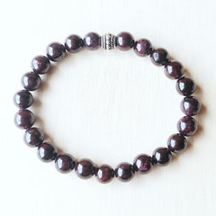 Natural Garnet beaded bracelet for men and women symbolising protection.