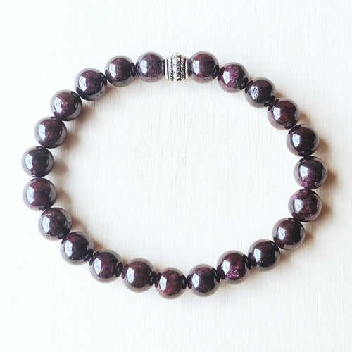 Natural Garnet beaded bracelet for men and women symbolising protection.