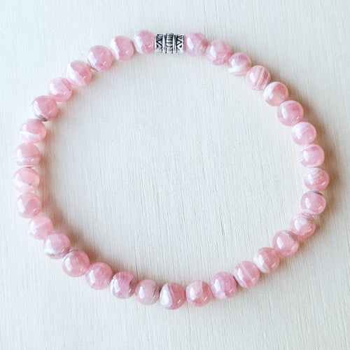 Natural pink gemstone bracelet opening the Heart Chakra.