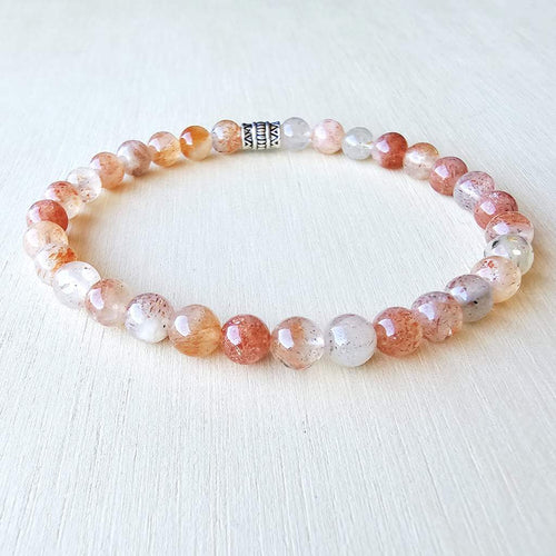 Orange gemstone bracelet activating Sacral and Solar Plexus Chakras.