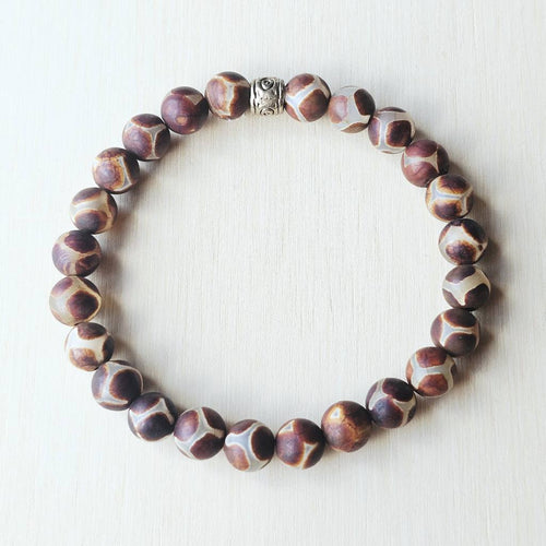 Natural Tibetan Agate gemstone bracelet offering protection and stability.