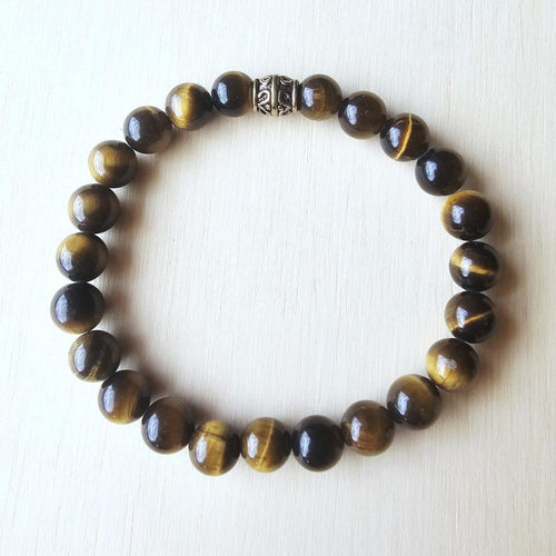 Natural Tiger’s Eye gemstone bracelet for solar plexus chakra empowerment.