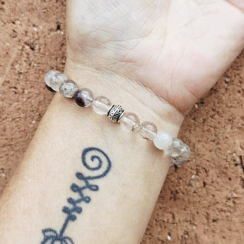 Handmade crystal bracelet with inclusions for clarity and chakra harmony.