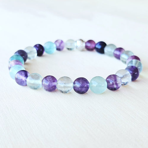 Handmade Rainbow Fluorite crystal bracelet for clarity and focus.