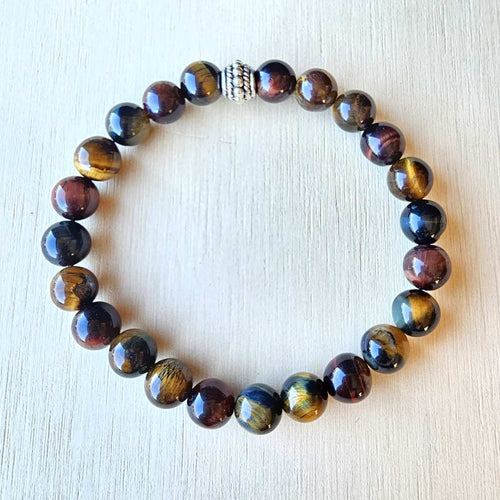 Triple Tiger’s Eye crystal bracelet for grounding, focus, and clear communication.