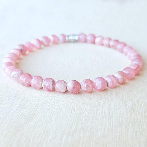 Handmade Rhodochrosite crystal bracelet for self-love and healing.