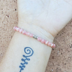Gemstone bracelet for love, joy, and emotional renewal.