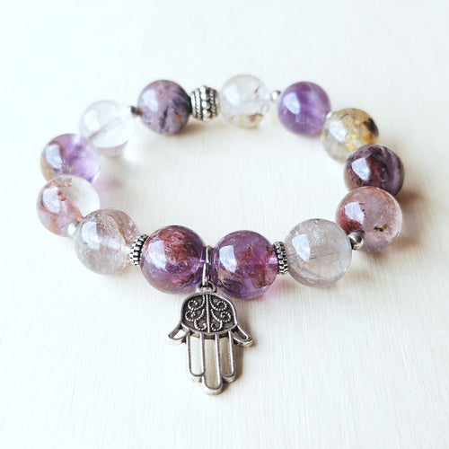 All-chakras aligned Super 7 gemstone bracelet 10mm for holistic energy balance.