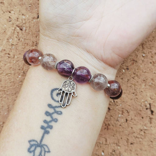 Super 7 bracelet 10mm natural gemstone for universal connection and awakened self.
