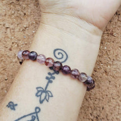 Melody Stone bracelet Super 7 for personal transformation and psychic ability.