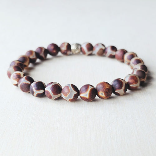 Handmade Tibetan Agate crystal bracelet for grounding and calm focus.