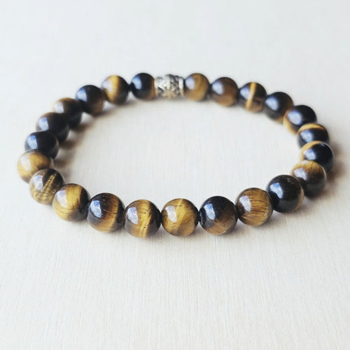 Handmade Tiger’s Eye crystal bracelet for grounding and focus.